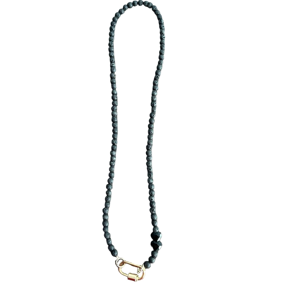 Black beaded necklace with gold tone pendant